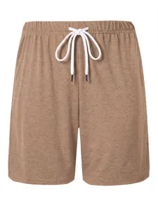 Close-up view of men's casual shorts texture and white drawstring detail, soft breathable fabric.