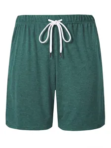 Mens vintage melange green casual shorts with white drawstring waist detailed texture closeup.