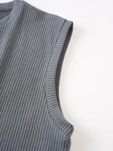 Detailed view of men's knit ribbed fitness sport slim fit v-neck wide shoulder tank top.