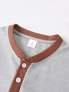 Men waffle knit contrast color henley shirt detail view, breathable short sleeve casual summer top.