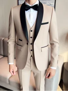 Detailed view of men slim fit three-piece suit with black shawl lapel and contrast trim.