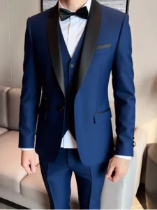 Men's royal blue tuxedo detail showing shawl lapel, slim fit jacket, vest and matching trousers.