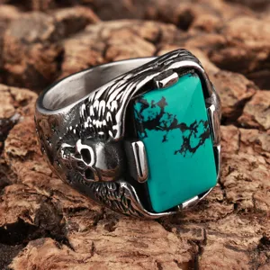 Vintage punk titanium steel ring with square turquoise and detailed skull wing carvings for men.