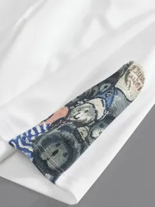 Détail t-shirt homme manches courtes en maille gaufrée, t-shirt blanc patch tissé.