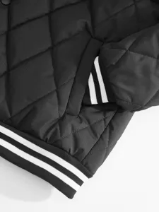 Men winter jacket detail view, black quilted puff coat with striped ribbed cuffs.