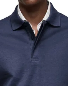 Men's long sleeve polo shirt detail view, business casual solid color lapel top for spring autumn.