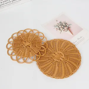 Macro view of woven round heat-resistant placemats with simulated rattan texture