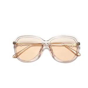 Modern oversized aviator sunglasses with champagne frames and tinted tea gradient lenses