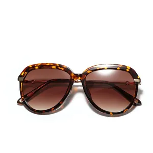Classic tortoise shell aviator sunglasses with brown gradient lenses and premium finish
