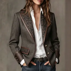 Detailansicht eines französischen Vintage-Wollblazers mit Fischgrätmuster und Revers