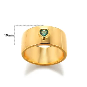 Macro view of 10mm wide gold-plated ring featuring a green heart-shaped zircon stone