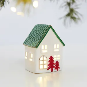 Cozy ceramic glowing Christmas house ornament with warm LED light for holiday decor