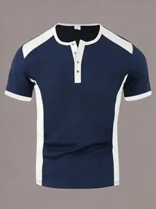 Colorblock short sleeve men shirt detail, henley collar with buttons and contrast trim.