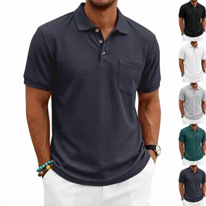 Close-up detail of the men's waffle knit short sleeve polo shirt showing chest pocket and collar.