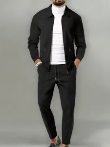 Men's waffle knit zip jacket and pants set with white turtleneck base layer detail.