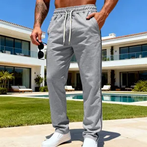 Detailed view of casual men's grey sweatpants featuring comfortable drawstring waist.