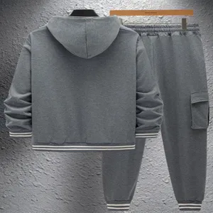 Men grey casual hoodie and sweatpants set with textured fabric, comfortable long sleeve streetwear.