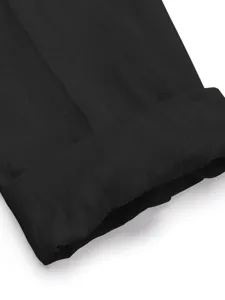 Black linen blend fabric detail close-up showing garment cuff and texture quality clearly.
