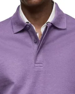 Close-up detail of mens long sleeve polo shirt lapel collar business casual style fabric view.