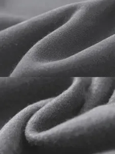 Close up detail of soft warm fleece fabric texture for men autumn winter hoodie clothing.