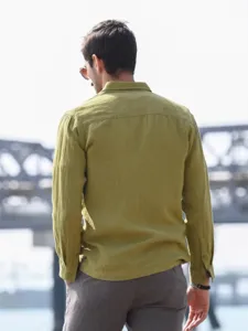 Detail view of men's casual long sleeve linen shirt in olive green, showing back fit.