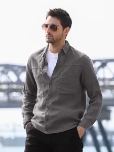 Men casual long sleeve gray linen shirt detail, featuring dual pockets and comfortable style.