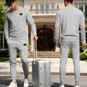 Ensemble sweat-shirt col rond et pantalon de survêtement gris homme, vêtement sport.