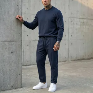 Men's casual long-sleeve crewneck sweatshirt and trousers set, solid navy blue, comfortable fit.