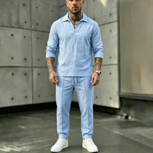 Detailed view of men light blue linen long sleeve shirt and trousers casual beach set.