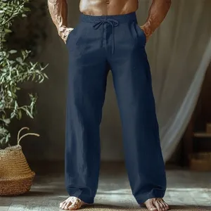 Casual linen trousers detail shot, breathable fabric, comfortable elastic drawstring waistband.
