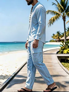 Men's casual linen long-sleeve shirt and cargo pants detail shot on a beach boardwalk.