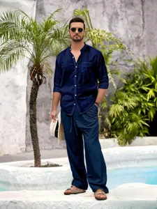 Details of men long sleeve mandarin collar linen shirt and trousers set with chest pocket.