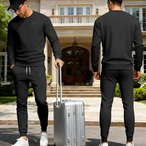 Ensemble de survêtement noir pour homme sweat-shirt à col rond et pantalon de jogging.