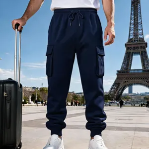 Men's fleece-lined cargo sweatpants in dark blue, featuring cuffed hems and utility pockets.