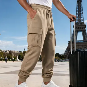 Men's fleece-lined khaki cargo sweatpants detail showing elastic cuffs and pockets.