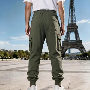 Men's fleece-lined cargo sweatpants in army green with elastic cuffs and multiple pockets.
