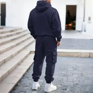 Back view detail of men's solid navy blue hooded sweatshirt and multi-pocket cargo pants set.