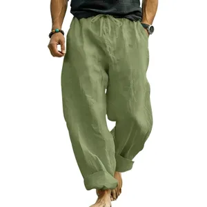 Vista dettagliata dei pantaloni casual larghi da uomo in lino con coulisse in vita.