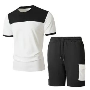 Set tuta sportivo da uomo con pantaloncini cargo colorblock e maniche corte estivo