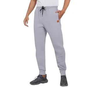 Pantalon de jogging gris pour homme en tricot confortable sport et survêtement cordon.