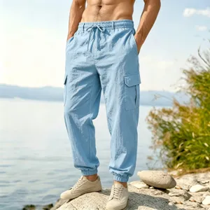Men's light blue cotton linen cargo jogger pants outdoor detail view shot clearly.