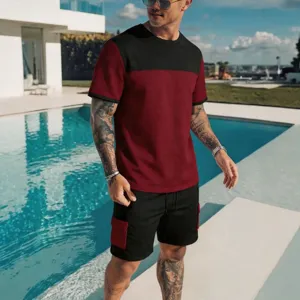 Set sportswear da uomo estivo con t-shirt manica corta color block e pantaloncini cargo.