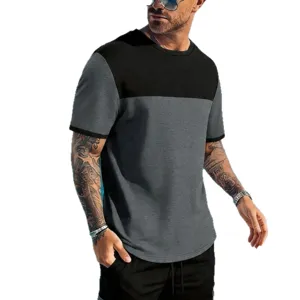 Set sportivo estivo da uomo con t-shirt a maniche corte colorblock e pantaloncini casual.