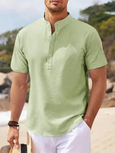 Men's casual short sleeve waffle knit mandarin collar shirt in light green summer top.