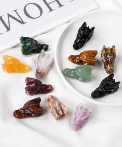 Cráneos de dragón de cristal natural tallados a mano en varios colores y gemas únicas