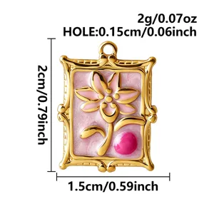 Detail view of pink enamel floral pendant showing dimensions 2cm x 1.5cm and 2g weight