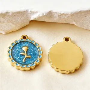 Detailed close-up showing both sides of a blue glitter tulip pendant charm for DIY jewelry