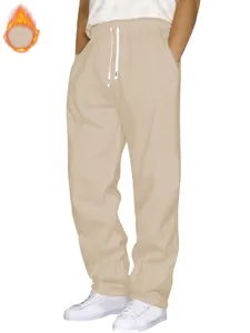 Casual solid color khaki sweatpants for men and women, comfortable athletic running pants.