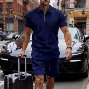 Men casual solid navy blue polo zipper short sleeve shirt and shorts set for summer fashion wear.