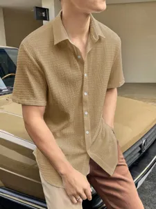 Men's casual short-sleeve textured commuter shirt in stylish khaki color for daily wear.